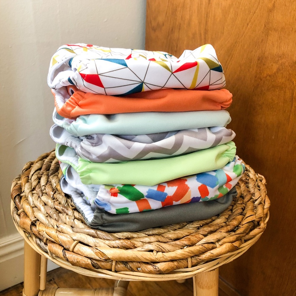 Set of 7 Nora’s Nursery Diapers